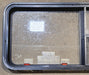 Used Black Radius Emergency Opening Window : 47 1/4" W x 21 1/4" H x 1 7/8" - Young Farts RV Parts