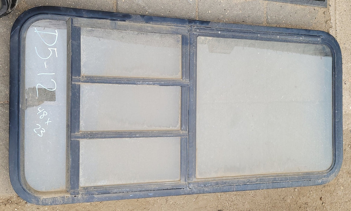 Used Black Radius Emergency Opening Window : 48 X 23 X 2" D - Young Farts RV Parts