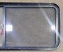 Used Black Radius Emergency Opening Window : 54 1/4" W x 21 3/4" H x 1 3/4" - Young Farts RV Parts