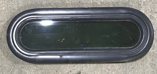 Used Black Radius Non Opening Window : 14 1/2" W X 4 1/2" H X 3/4" D - Young Farts RV Parts