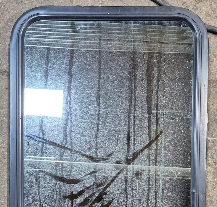Used Black Radius Non Opening Window : 21 3/4" W x 42 1/4" H x 2" - Young Farts RV Parts