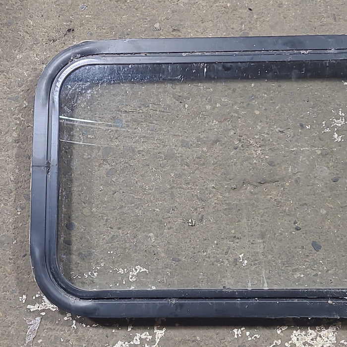 Used Black Radius Non Opening Window : 24 1/4" W x 16 3/4" H x 1 7/8" D - Young Farts RV Parts