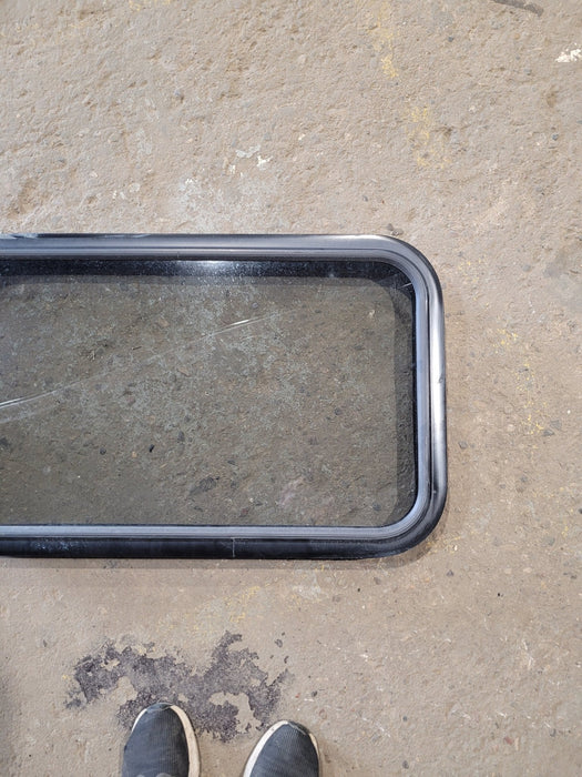 Used Black Radius Non Opening Window : 29 1/2" W x 17 1/2" H x 1 7/8" D - Young Farts RV Parts