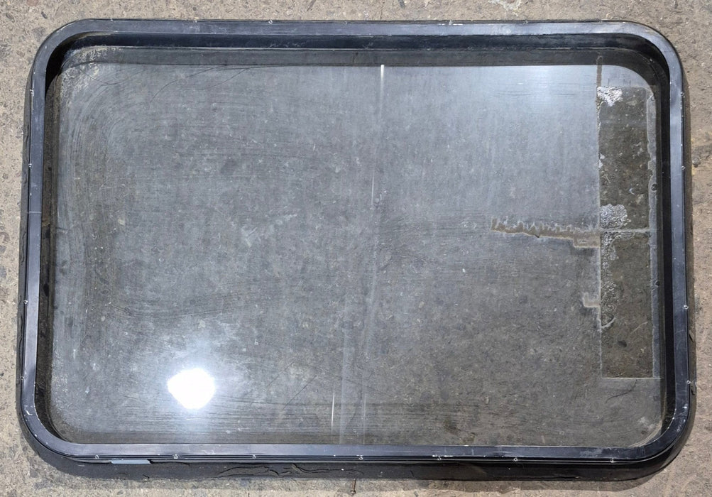 Used Black Radius Non - Opening Window : 34 1/4 x 23 1/4 x 1 1/2" D - Young Farts RV Parts