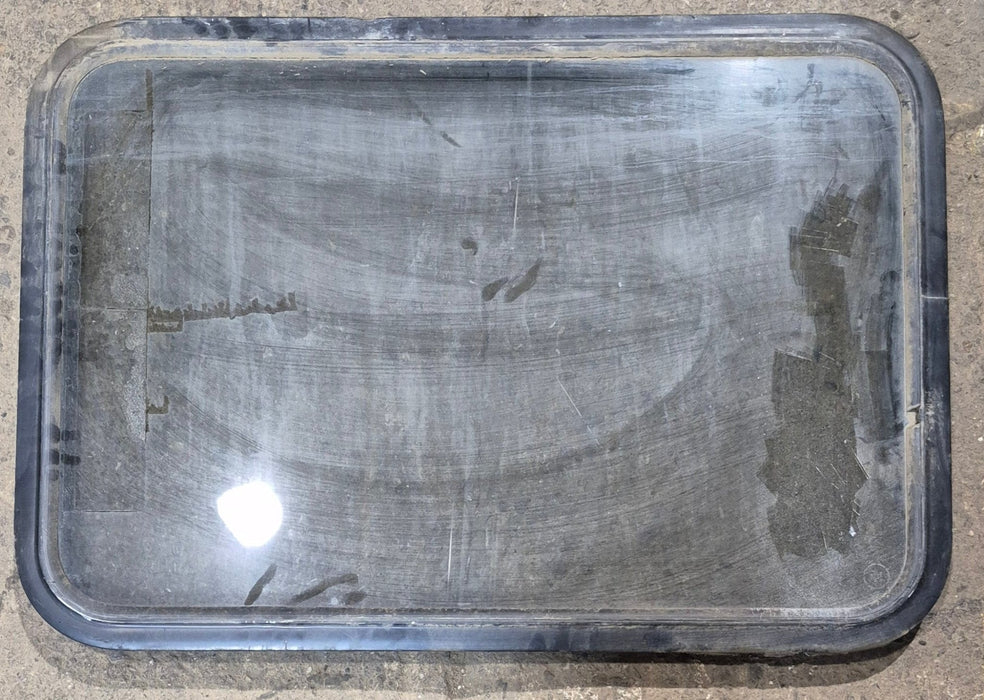 Used Black Radius Non - Opening Window : 34 1/4 x 23 1/4 x 1 1/2" D - Young Farts RV Parts