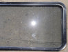 Used Black Radius Non Opening Window : 57 1/2" W x 21 1/2" H x 1 1/4" - Young Farts RV Parts