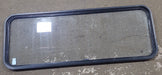 Used Black Radius Non Opening Window : 59 3/4" W x 21 1/2" H x 1 1/2" D - Young Farts RV Parts