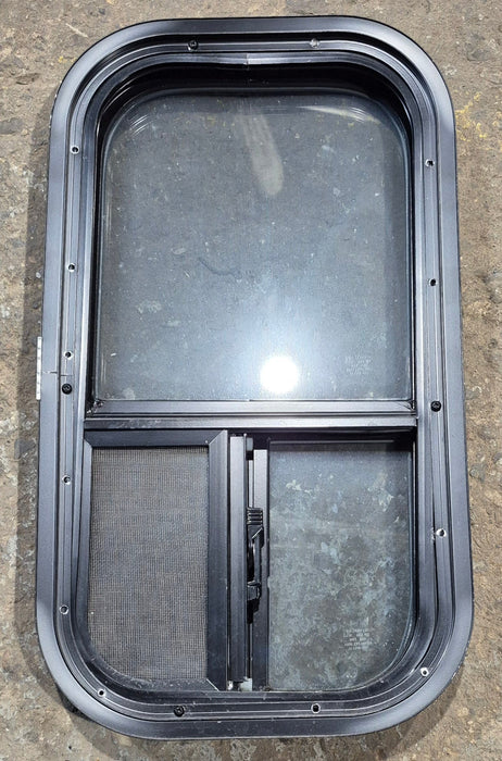 Used Black Radius Opening Window : 11 1/2" W x 21 1/4" H x 1 3/4" D - Young Farts RV Parts