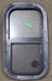 Used Black Radius Opening Window : 11 5/8" W X 21 3/8" H X 1 7/8" D - Young Farts RV Parts