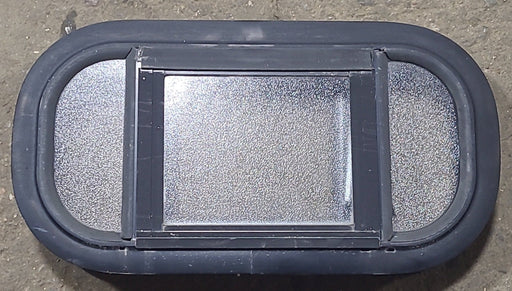 Used Black Radius Opening Window : 17 1/2" W x 8 1/2" H x 1 3/4" D - Young Farts RV Parts