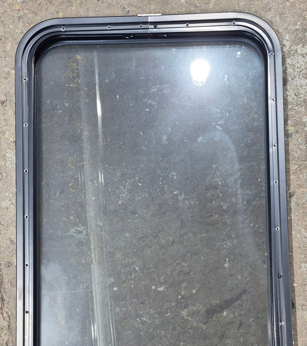 Used Black Radius Opening Window : 21 1/4" W x 47 1/4" H x 1 3/4" D - Young Farts RV Parts