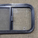 Used Black Radius Opening Window : 23 1/2" W x 14 1/2" H x 1 1/4" D - Young Farts RV Parts