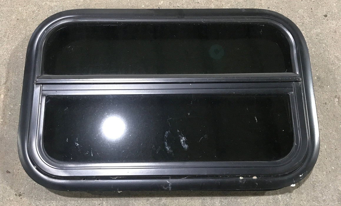 Used Black Radius Opening Window : 23 1/2" W x 14 1/2" H x 1 7/8" - Young Farts RV Parts