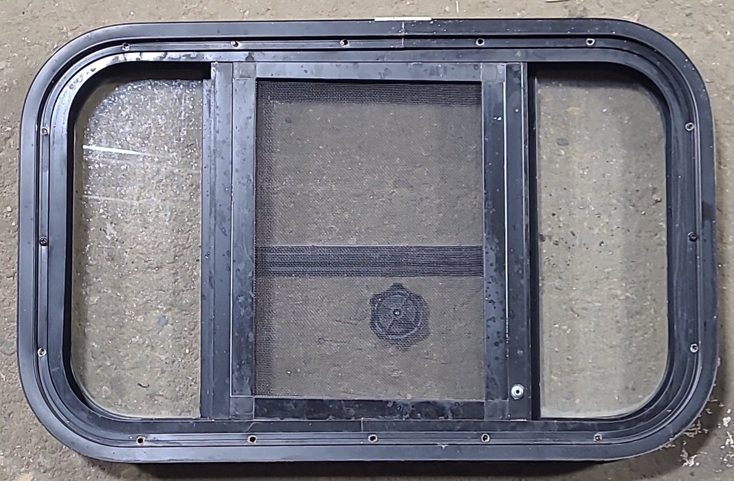 Used Black Radius Opening Window : 23 1/2" W x 14 1/2" H x 2" D - Young Farts RV Parts