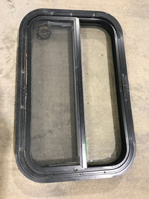 Used Black Radius Opening Window : 23 1/2" W x 14 3/4" H x 2" - Young Farts RV Parts