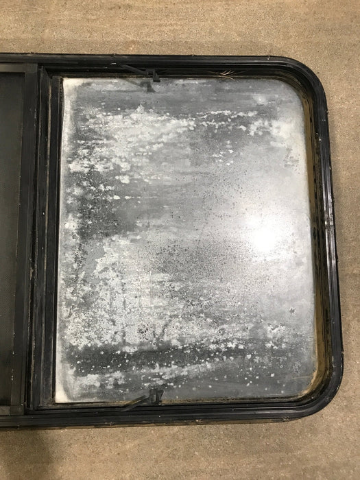 Used Black Radius Opening Window : 23 1/2" W x 28 1/2" H x 2" D - Young Farts RV Parts
