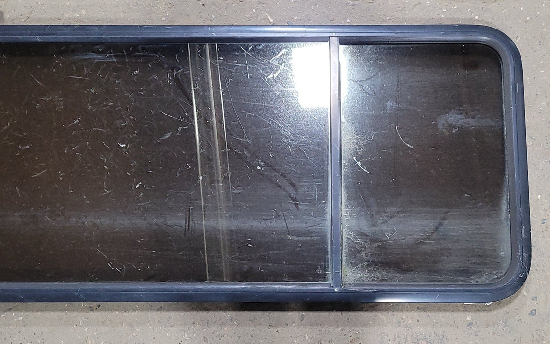 Used Black Radius Opening Window : 23 1/2" W X 59 1/2" H X 1 7/8" D - Young Farts RV Parts