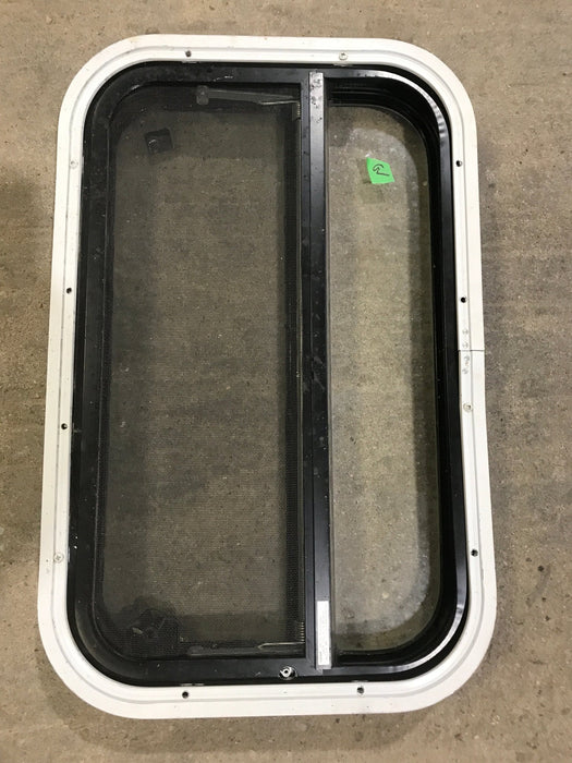 Used Black Radius Opening Window : 23 1/4" W X 14 1/2" H X 2" D - Young Farts RV Parts