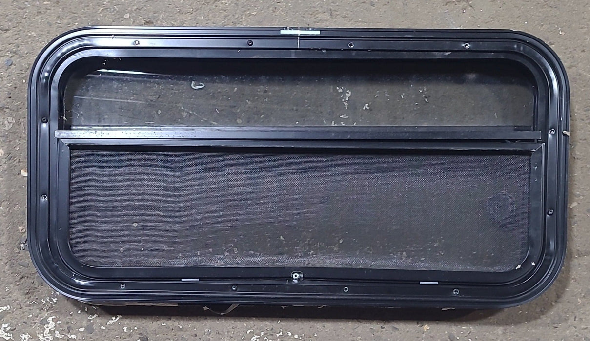 Used Black Radius Opening Window : 23 1/4" W x 14 1/4" H x 1 7/8" D - Young Farts RV Parts