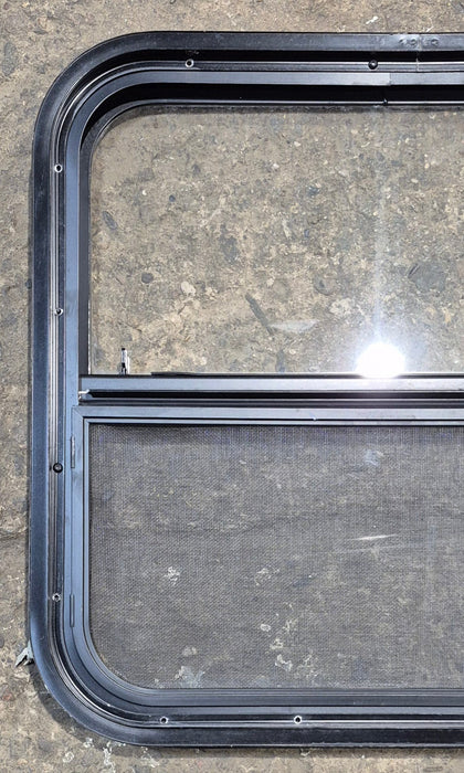 Used Black Radius Opening Window : 23 1/4" W x 21 1/4" H x 1 1/2" - Young Farts RV Parts