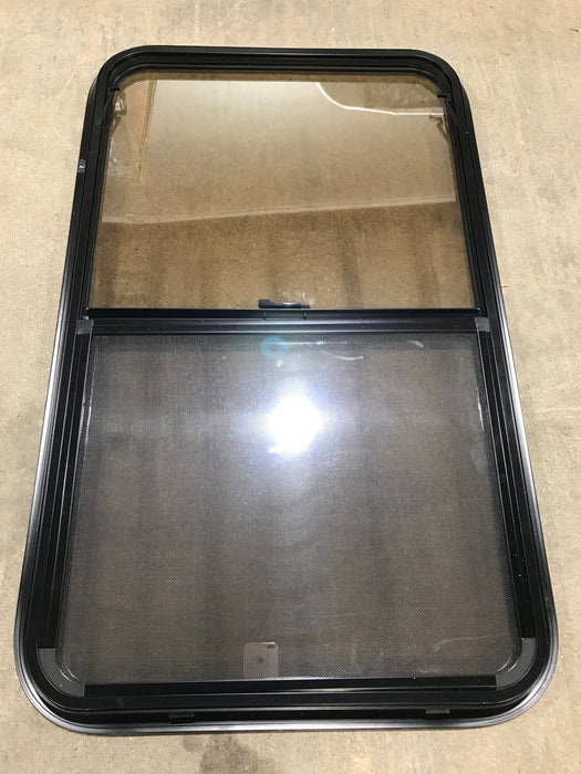 Used Black Radius Opening Window : 23 3/4" W x 39 3/4" H x 1 1/2" D - Young Farts RV Parts