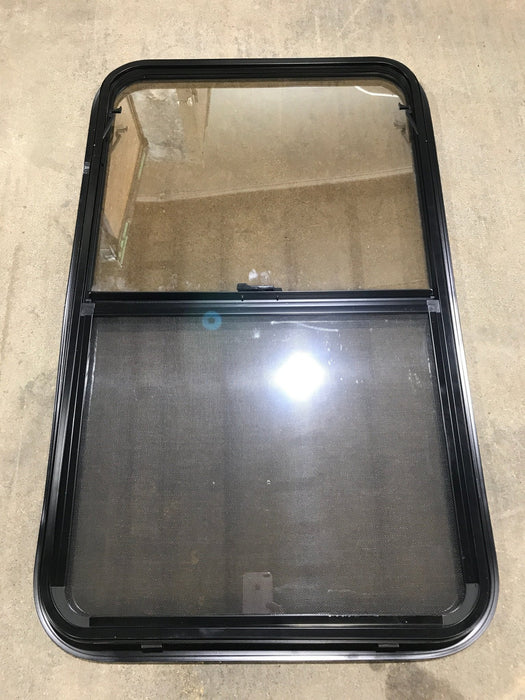 Used Black Radius Opening Window : 23 3/4" W x 39 3/4" H x 1 1/2" D - Young Farts RV Parts