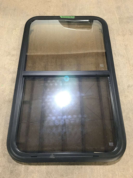 Used Black Radius Opening Window : 23 3/4" W x 39 3/4" H x 1 1/2" D - Young Farts RV Parts
