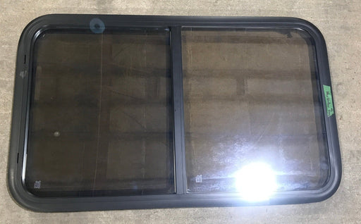 Used Black Radius Opening Window : 23 3/4" W x 39 3/4" H x 1 1/2" D - Young Farts RV Parts
