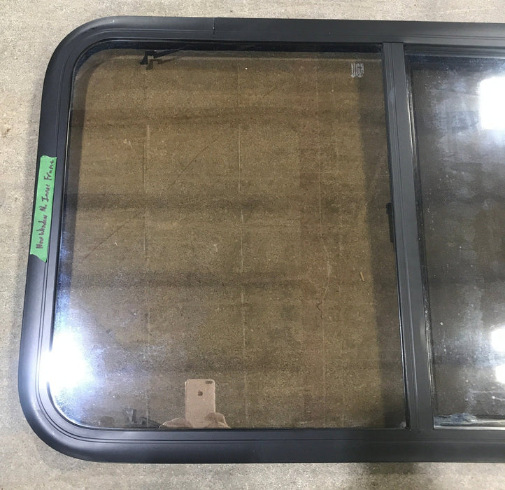 Used Black Radius Opening Window : 23 3/4" W x 39 3/4" H x 1 1/2" D - Young Farts RV Parts