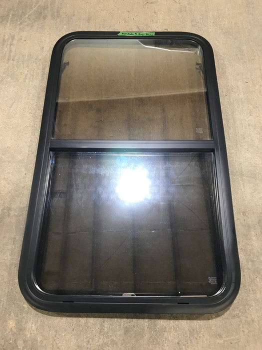 Used Black Radius Opening Window : 23 3/4" W x 39 3/4" H x 1 1/2" D - Young Farts RV Parts