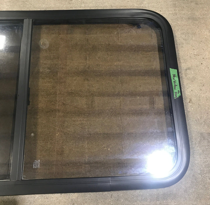Used Black Radius Opening Window : 23 3/4" W x 39 3/4" H x 1 1/2" D - Young Farts RV Parts