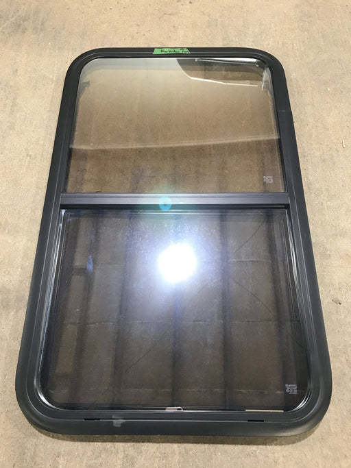 Used Black Radius Opening Window : 23 3/4" W x 39 3/4" H x 1 1/2" D - Young Farts RV Parts