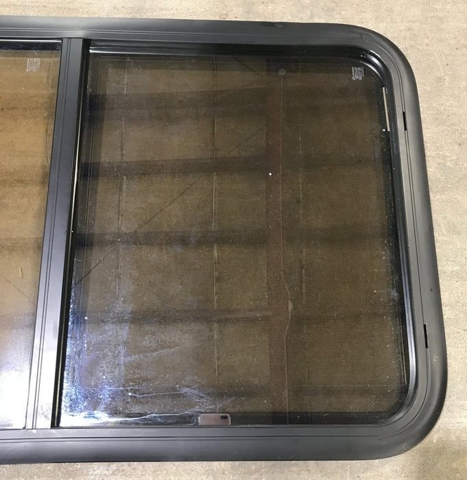 Used Black Radius Opening Window : 23 3/4" W x 39 3/4" H x 1 1/2" D - Young Farts RV Parts