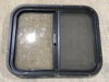 Used Black Radius Opening Window : 24 1/2" W x 19 1/4" H x 1 1/4" - Young Farts RV Parts