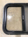 Used Black Radius Opening Window : 24 1/2" W x 19 1/4" H x 1 1/4" - Young Farts RV Parts
