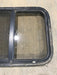 Used Black Radius Opening Window : 24 1/2" W x 19 1/4" H x 1 1/4" - Young Farts RV Parts