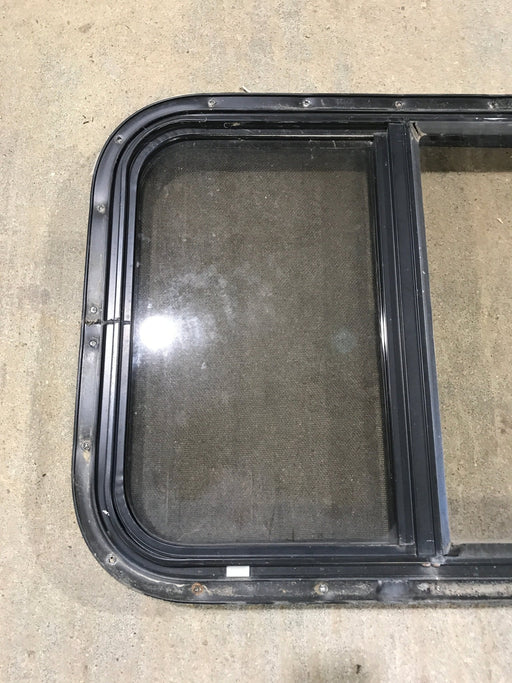 Used Black Radius Opening Window : 24 1/2" W x 19 1/4" H x 1 1/4" - Young Farts RV Parts
