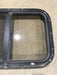 Used Black Radius Opening Window : 24 1/2" W x 19 1/4" H x 1 1/4" - Young Farts RV Parts