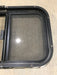 Used Black Radius Opening Window : 24 1/2" W x 19 1/4" H x 1 1/4" - Young Farts RV Parts