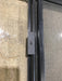 Used Black Radius Opening Window : 24 1/2" W x 19 1/4" H x 1 1/4" - Young Farts RV Parts