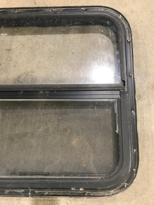 Used Black Radius Opening Window : 24 1/2" W x 22 1/2" H x 2" D - Young Farts RV Parts