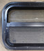 Used Black Radius Opening Window : 24 1/4" W x 14 1/4" H x 1 7/8" - Young Farts RV Parts