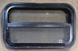 Used Black Radius Opening Window : 24 1/4" W x 14 1/4" H x 1 7/8" - Young Farts RV Parts