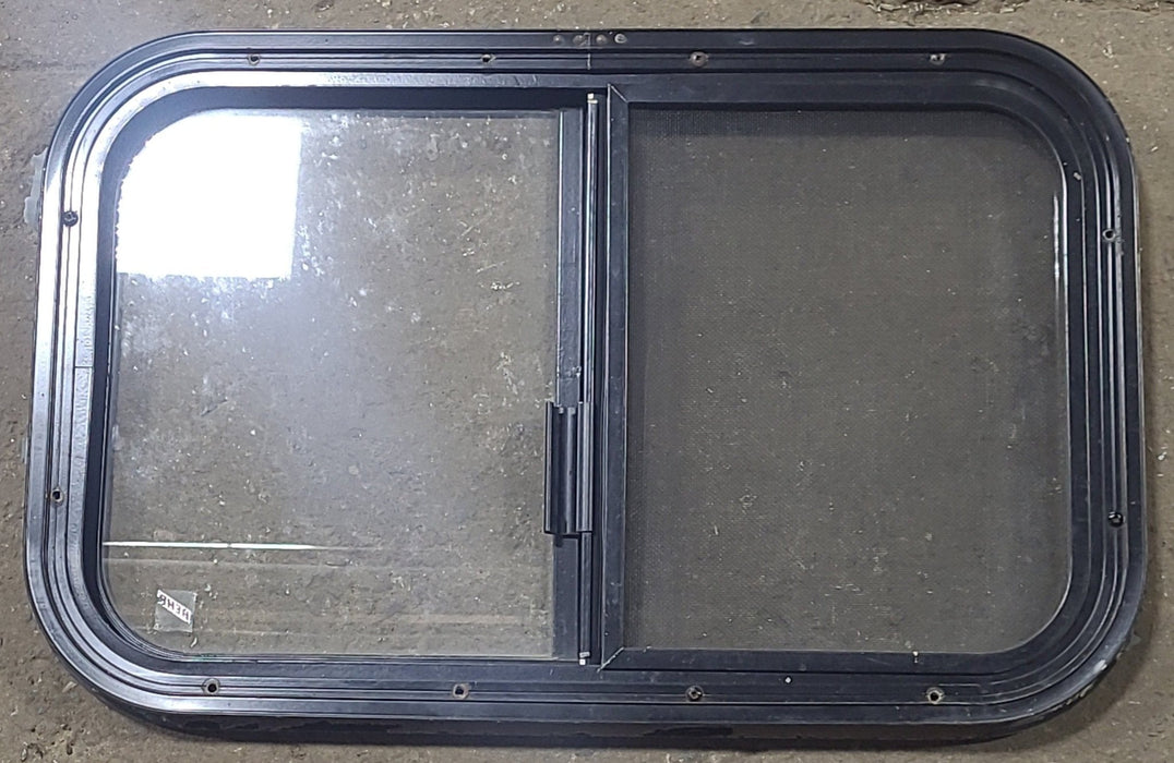 Used Black Radius Opening Window : 24 1/4" W x 14 3/4" H x 1" D - Young Farts RV Parts