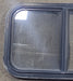 Used Black Radius Opening Window : 24 1/4" W x 14 3/4" H x 1" D - Young Farts RV Parts