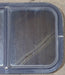 Used Black Radius Opening Window : 24 1/4" W x 14 3/4" H x 2" D - Young Farts RV Parts