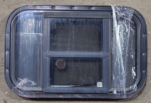 Used Black Radius Opening Window : 24 1/4" W x 16" H x 1 1/4" D - Young Farts RV Parts