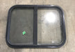 Used Black Radius Opening Window : 24 1/4" W x 17 3/4" H x 1 1/4" - Young Farts RV Parts