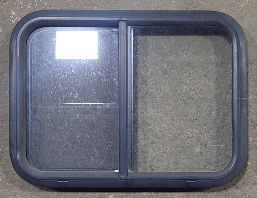 Used Black Radius Opening Window : 24 1/4" W x 17 3/4" H x 1 7/8" D - Young Farts RV Parts