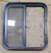 Used Black Radius Opening Window : 24 1/4" W x 25 3/4" H x 1 3/4" - Young Farts RV Parts